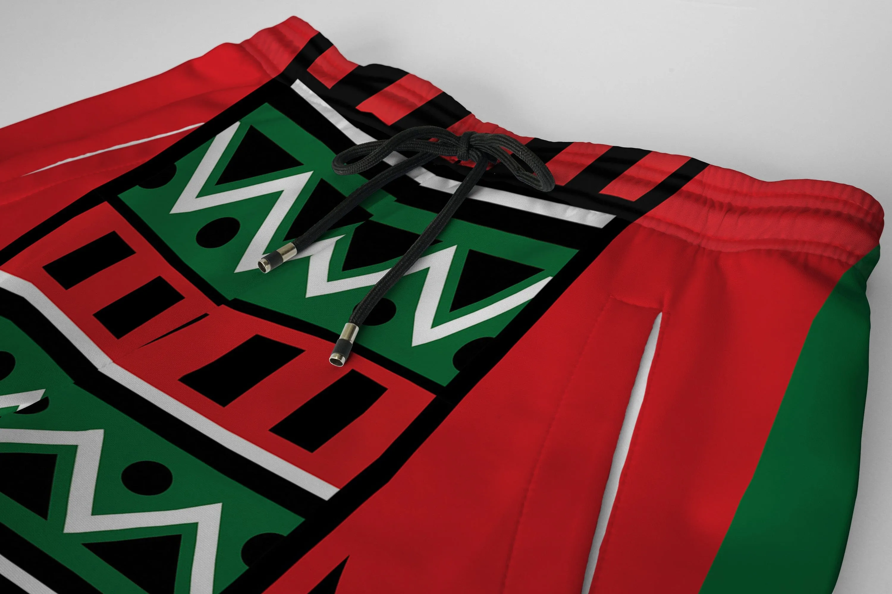 Power Fist And Patterns In Pan African Colors Joggers