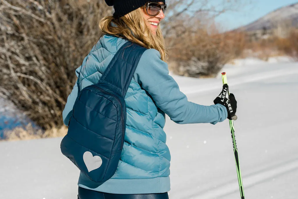 Puffer Crossbody Backpack in Shimmer Navy Blue with Silver Heart